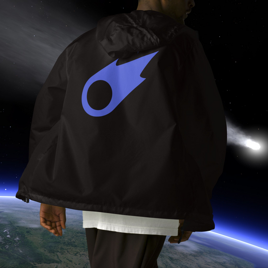 Person wearing a black Stellarwear jacket with a blue 3I ATLAS symbol, standing on Earth with a space background
