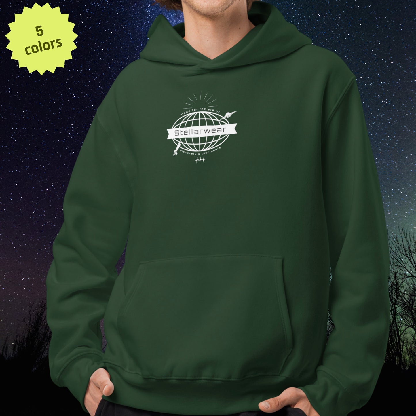 Green Stellarwear hoodie with a UFO logo on a dark background