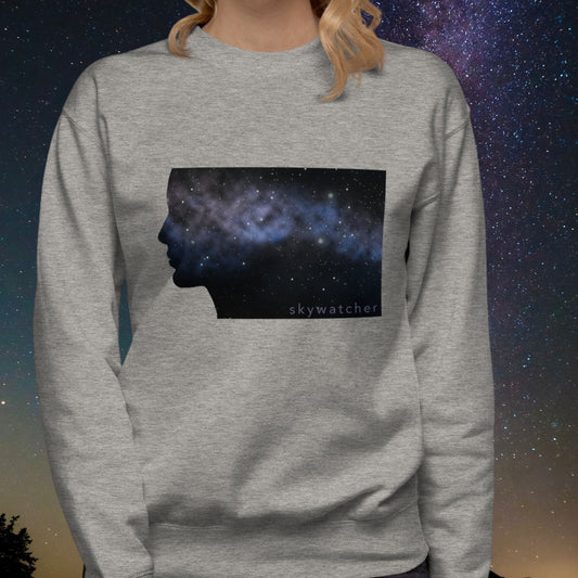 Stellarwear gray sweatshirt with a silhouette of a face and 'skywatcher' text against a starry night sky background.