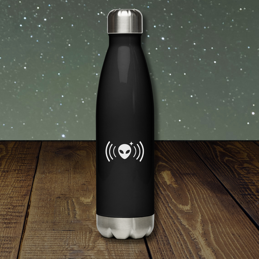 Stellarwear black water bottle with alien signal design on a wooden surface with starry night background