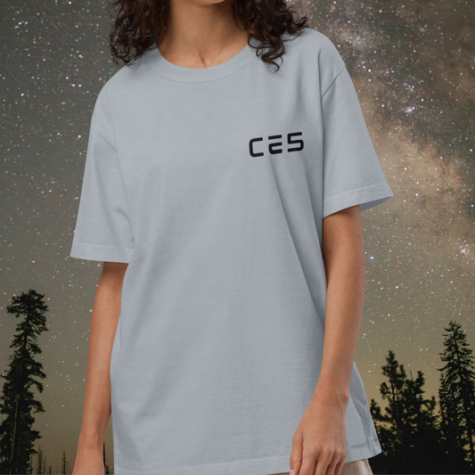 Person wearing a light blue Stellarwear t-shirt with 'CE5' logo against a starry night sky background