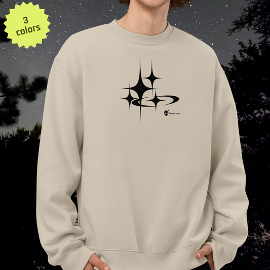 Beige Stellarwear sweatshirt with black star graphic design on a dark background