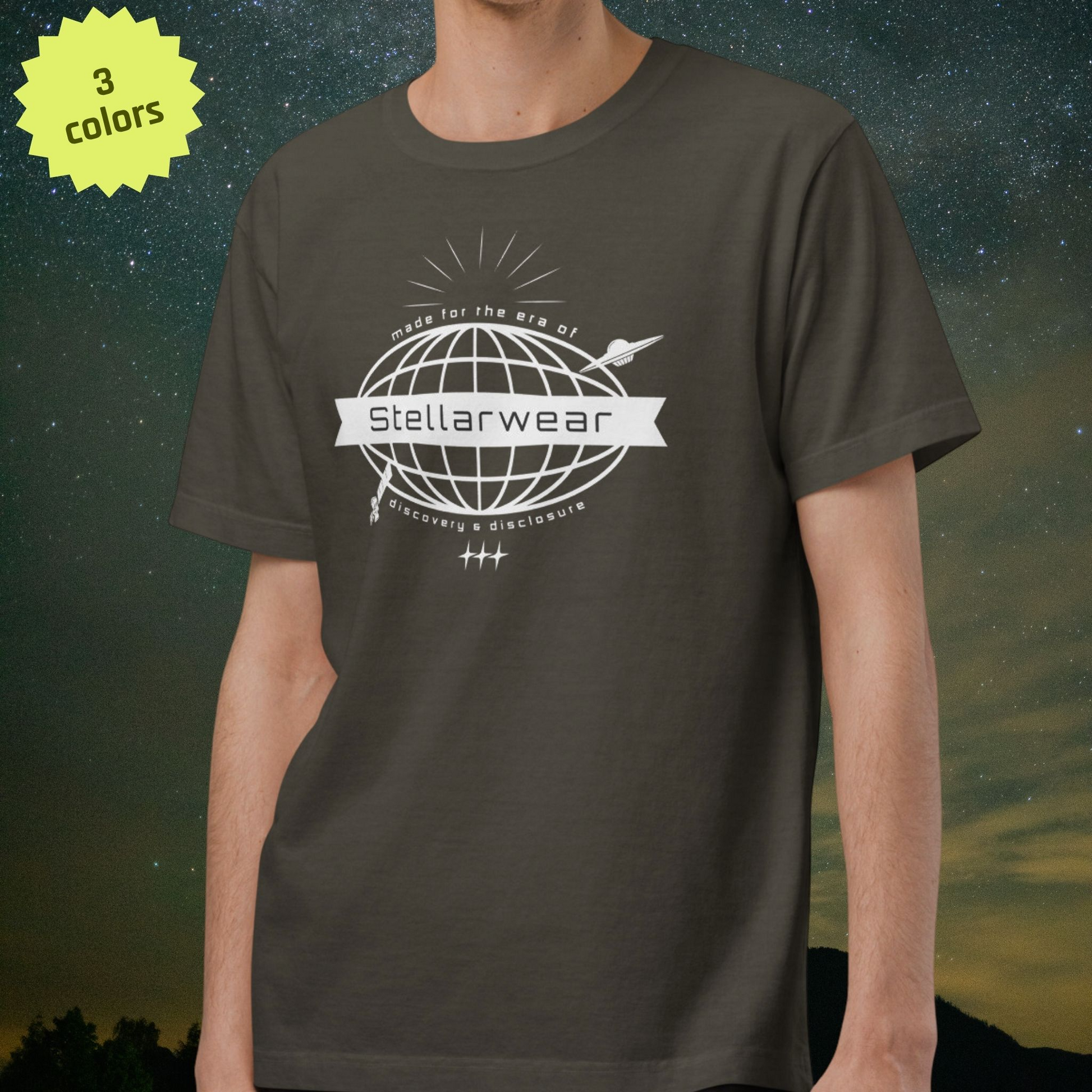 Person wearing a dark gray t-shirt with 'Stellarwear' logo against a starry night sky.