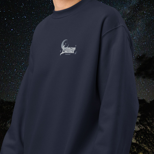 Navy blue Stellarwear sweatshirt with a lunar logo on a dark space-themed background