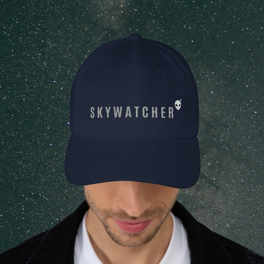 Stellarwear navy blue cap with 'SKYWATCHER' logo on a starry night sky background