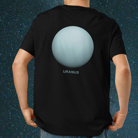 Man wearing a Stellarwear black organic cotton t shirt with an image of the planet Uranus against a starry sky background